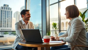 Business coach Los Angeles discussing strategies with a client over coffee.