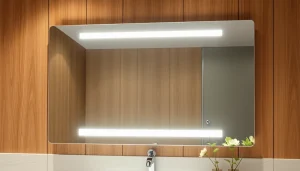 Elevate your space with a stunning bathroom mirror with LED light reflecting modern elegance.